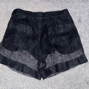 Small see-through shorts.